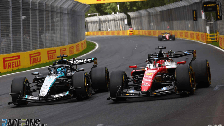 Duel rapproché entre une Mercedes et une Ferrari en course de F1