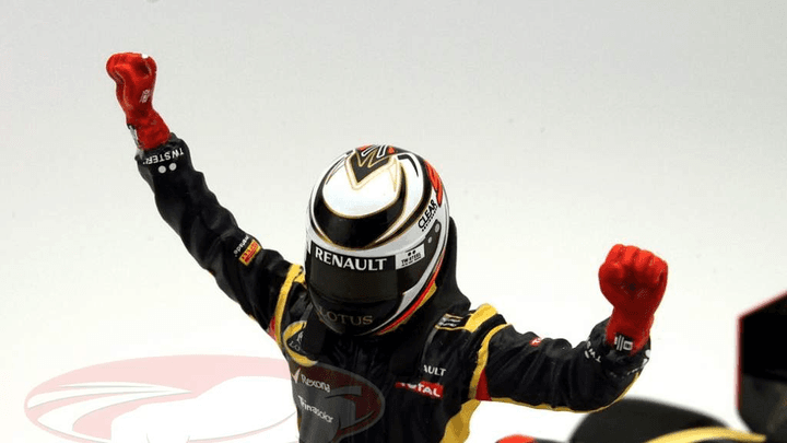 Kimi Räikkönen célébrant une victoire avec sa Lotus F1 en 2012 ou 2013