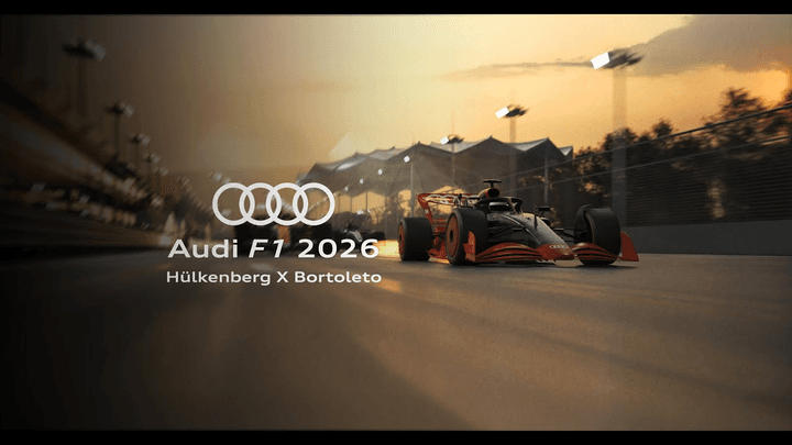 Voiture de Formule 1 Audi sur piste avec logo "Audi F1 2026" et mentions Hülkenberg & Bortoleto