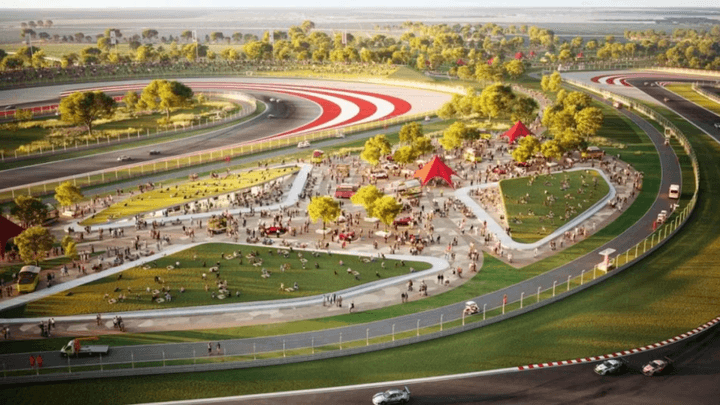 Vue aérienne d'un circuit de Formule 1 moderne avec tracé sinueux et tribunes colorées